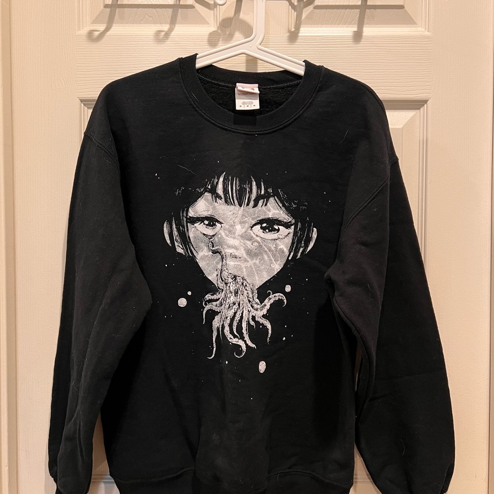 OMOCAT Black Graphic Sweatshirt with Artistic Face Design